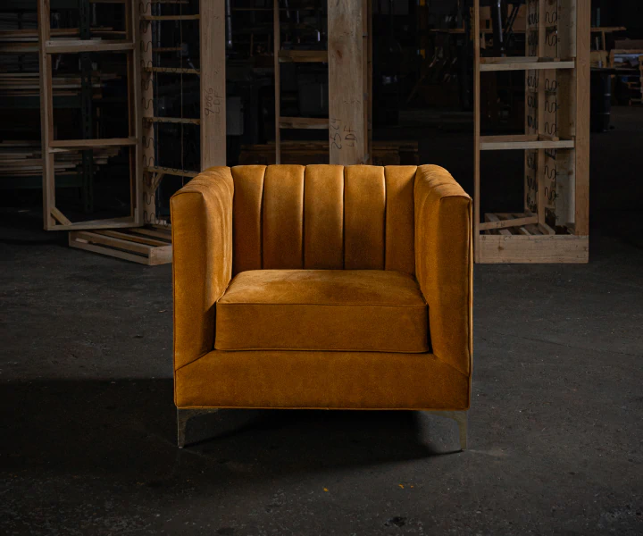 orange chair in dark warehouse
