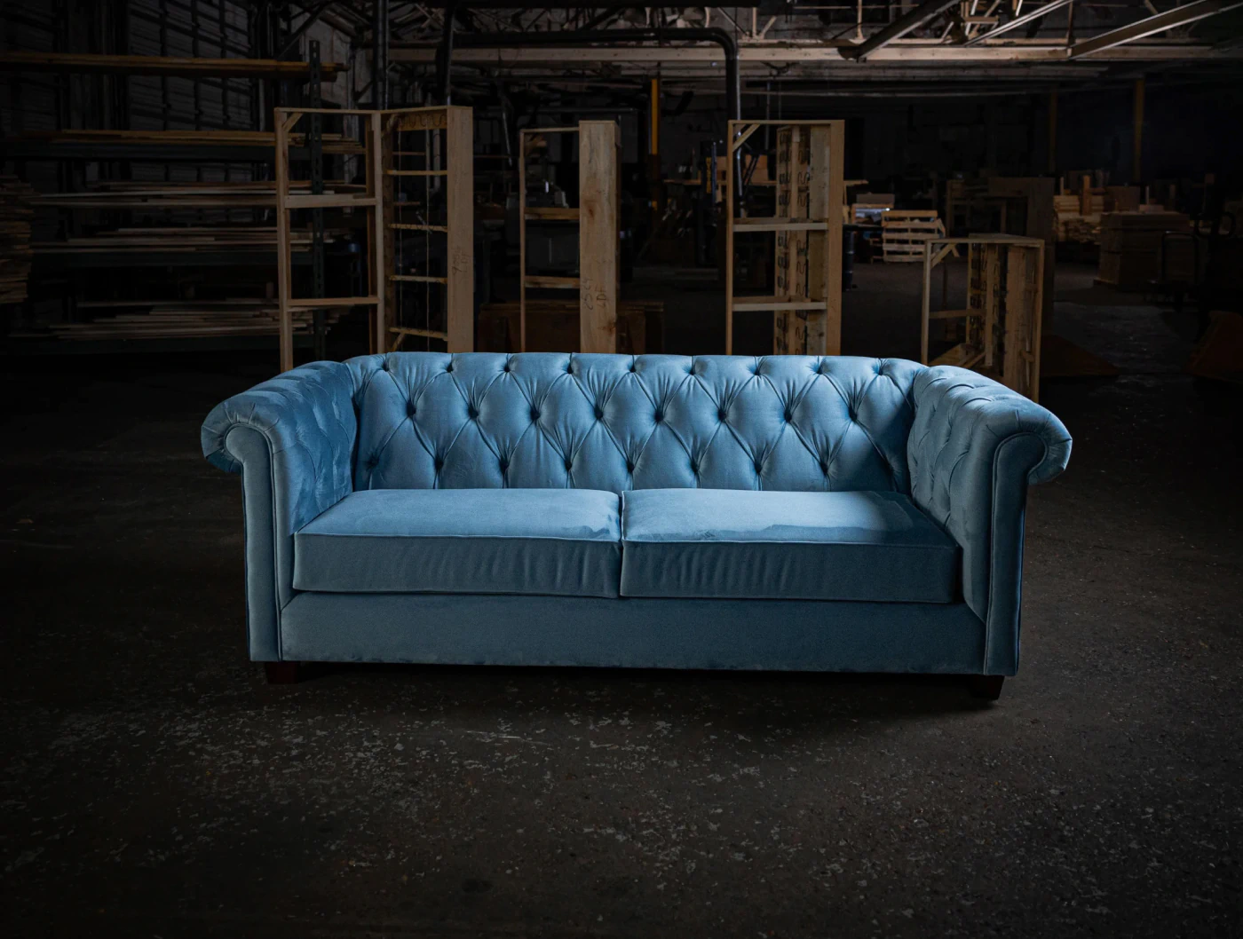 Custom blue velvet sofa made by Living Designs Furniture